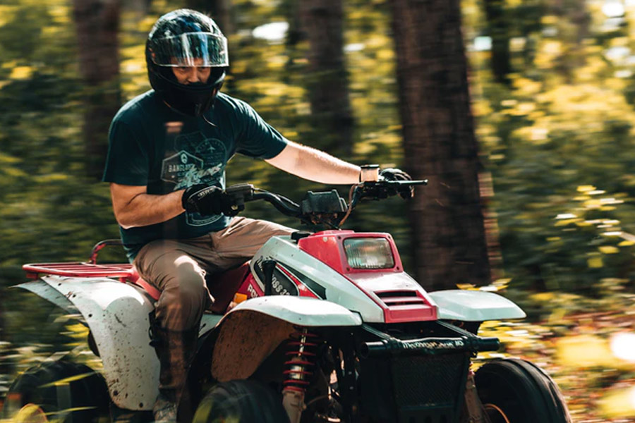Man riding ATV | Recreational Insurance